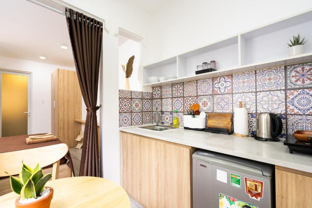 Dining nook beside the kitchen at Ekomo Home 102 - Central Saigon